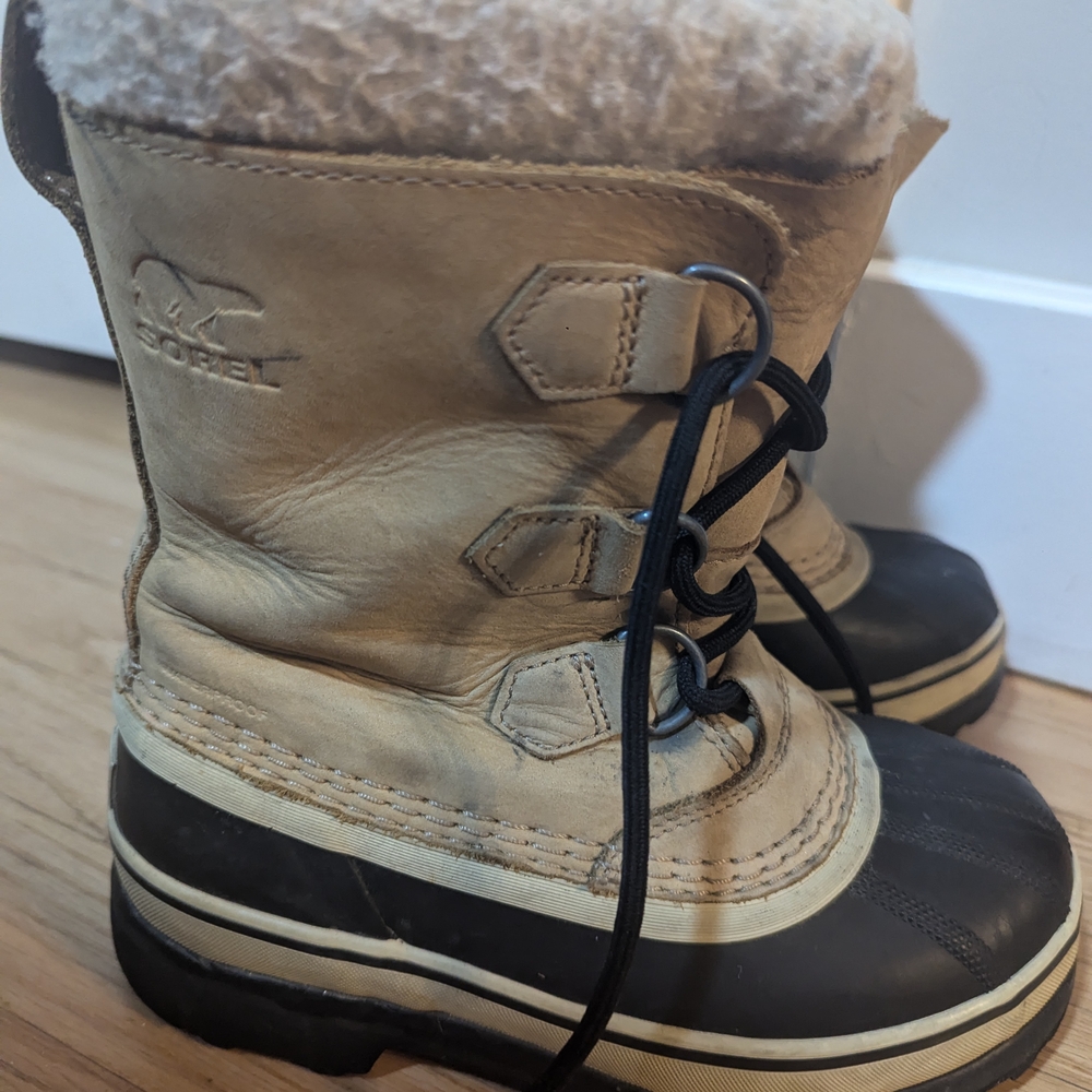 Sorel Tan and Black Winter Boots